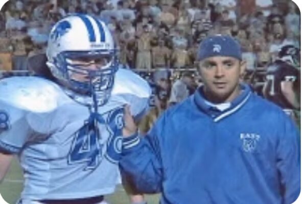 Brady on the field with his coach